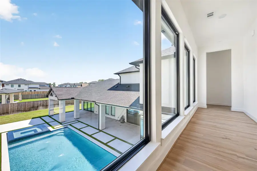 Upstairs, the views continue with two additional bedrooms including the 2nd Primary Suite to continue the home’s luxurious design.