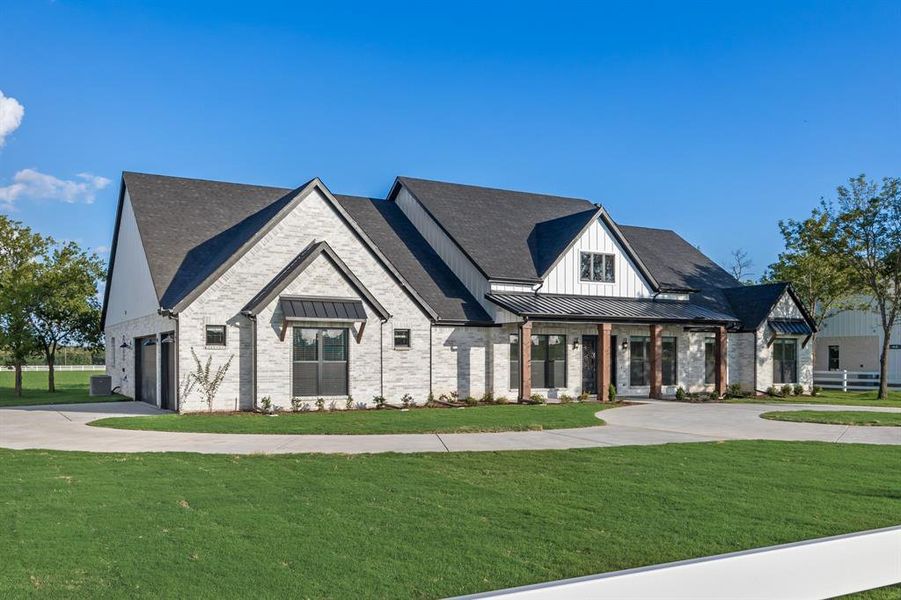 Front exterior of a new home in , McLendon-Chisholm, TX, highlighting curb appeal (Image 2). Front exterior of a new home in , McLendon-Chisholm, TX, highlighting curb appeal (Image 2).
