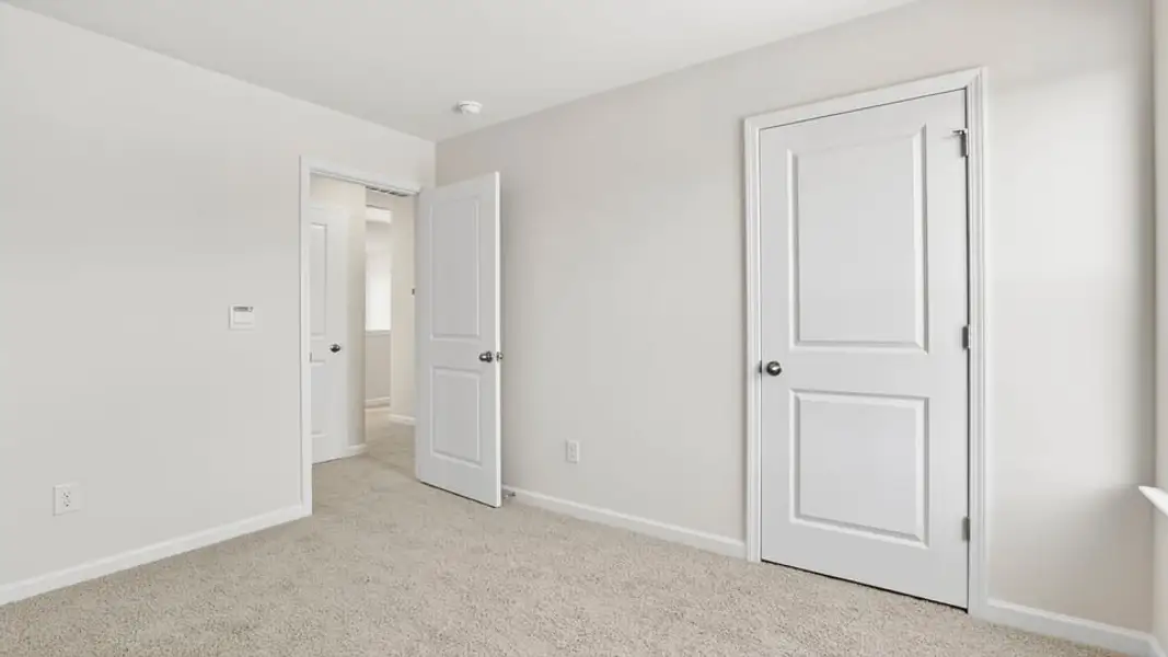 Spacious, unfurnished interior of a new home in Durbin Meadows Traditions, Fountain Inn (Image 29).
