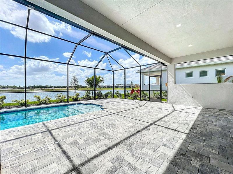 Exterior details and patio area of a home in Watercolor Place, Bradenton (Image 4).