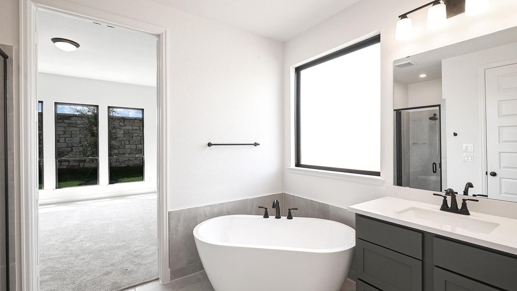 Furnished interior view inside a new home in 6 Creeks 45', Kyle (Image 11).