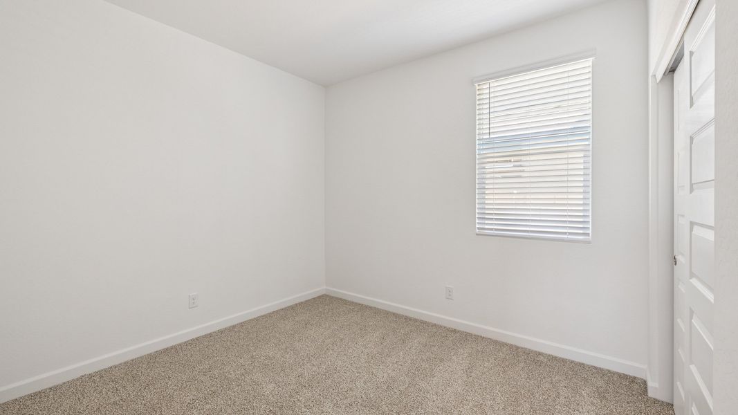 Spacious, unfurnished interior of a new home in Apache Farms, Buckeye (Image 24).