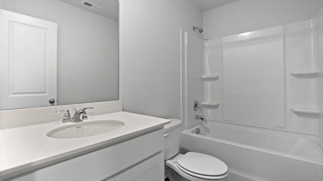 Representative furnished interior of a home built from the BRANDON by D.R. Horton in Rivers Reach, Yemassee (Image 12).