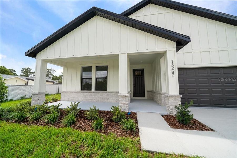 Exterior details and patio area of a home in , Spring Hill (Image 29).