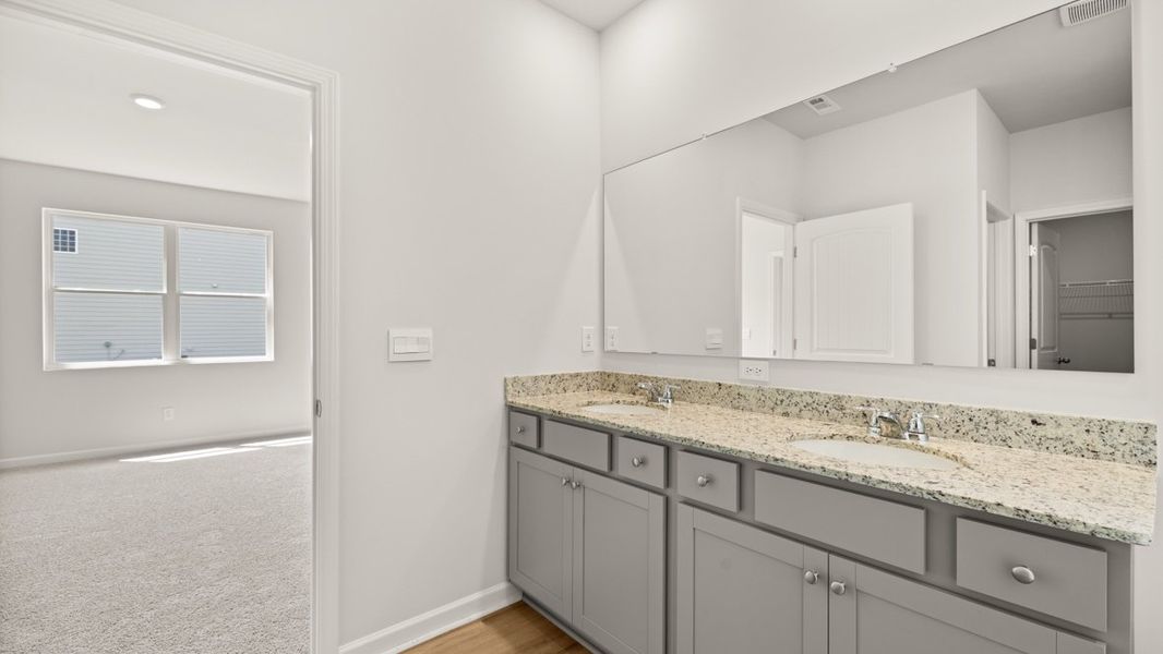 Representative furnished interior of a home built from the Cali by D.R. Horton in Sheffield Highlands, Dallas (Image 13).