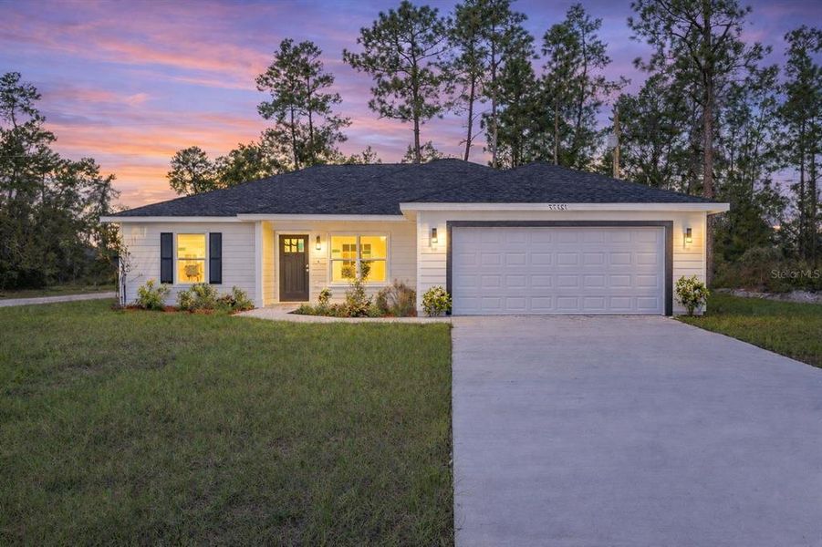 Front exterior of a new home in , Ocala, FL, highlighting curb appeal (Image 2). Front exterior of a new home in , Ocala, FL, highlighting curb appeal (Image 2).