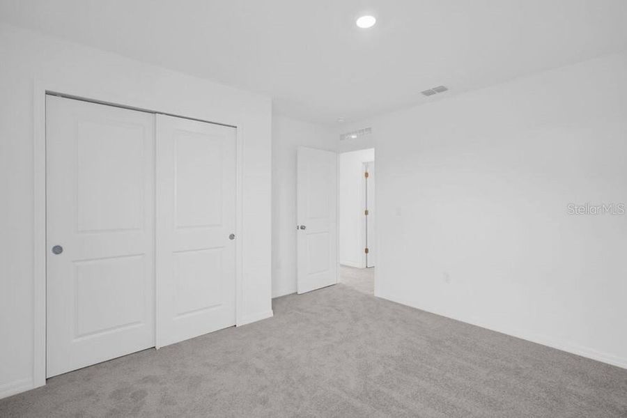 Spacious, unfurnished interior of a new home in Waterstone, Groveland (Image 47). Spacious, unfurnished interior of a new home in Waterstone, Groveland (Image 47).