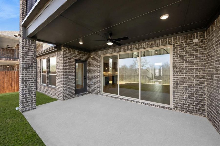 Exterior details and patio area of a home in High Country, Burleson (Image 28).