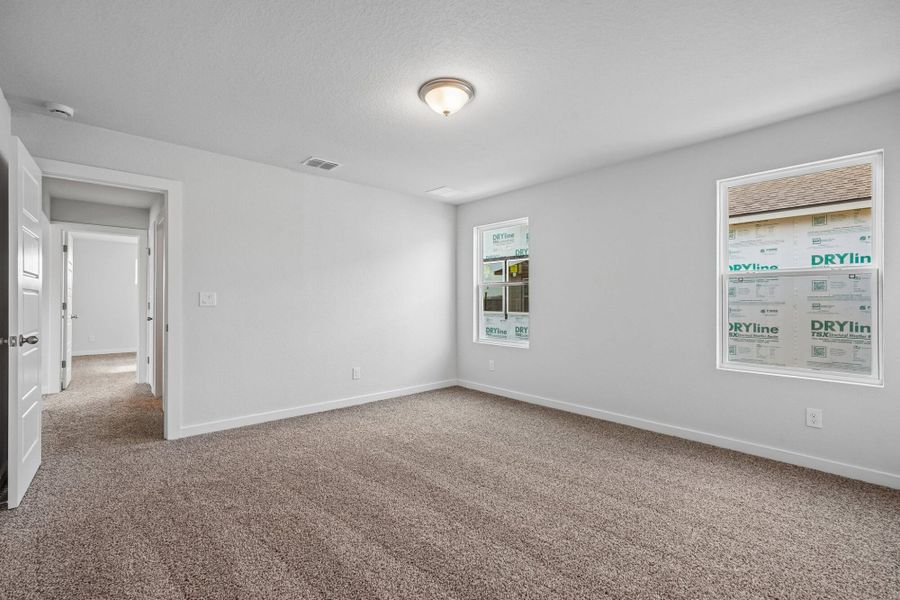 Spacious, unfurnished interior of a new home in The Meadows at Hunters Ranch, San Antonio (Image 43).
