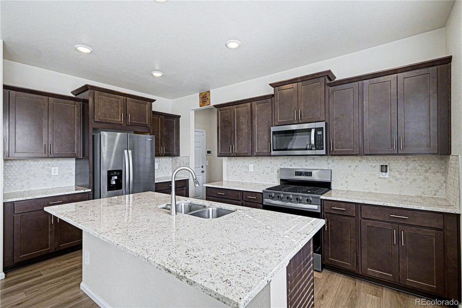 Furnished interior view inside a new home in Murphy Creek, Aurora (Image 16).