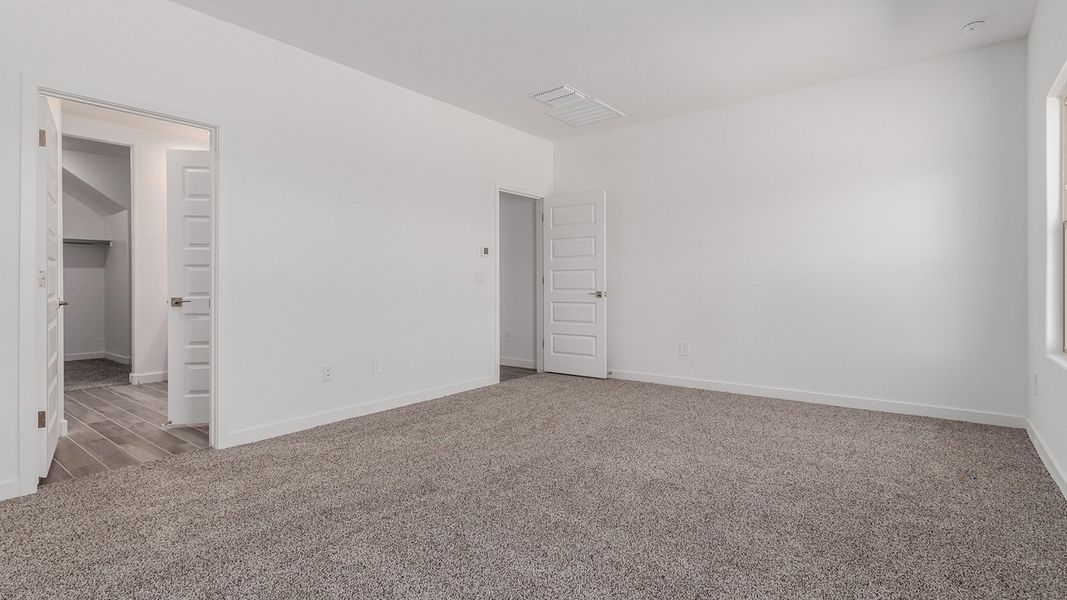 Representative unfurnished interior of a home built from the River by D.R. Horton in The Oasis at Rocking K, Vail (Image 26).