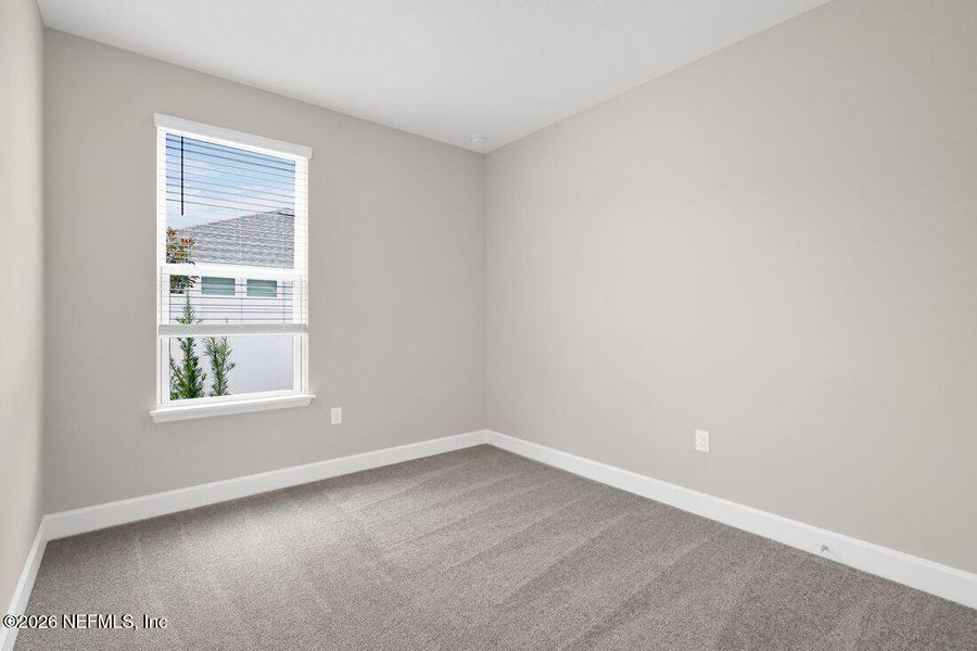 Spacious, unfurnished interior of a new home in Colbert Landings, Palm Coast (Image 12).