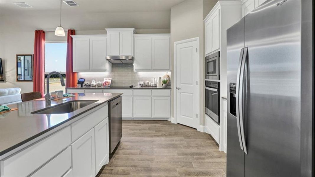 Furnished interior view inside a new home in Lakeview Pointe, Grand Prairie (Image 8).