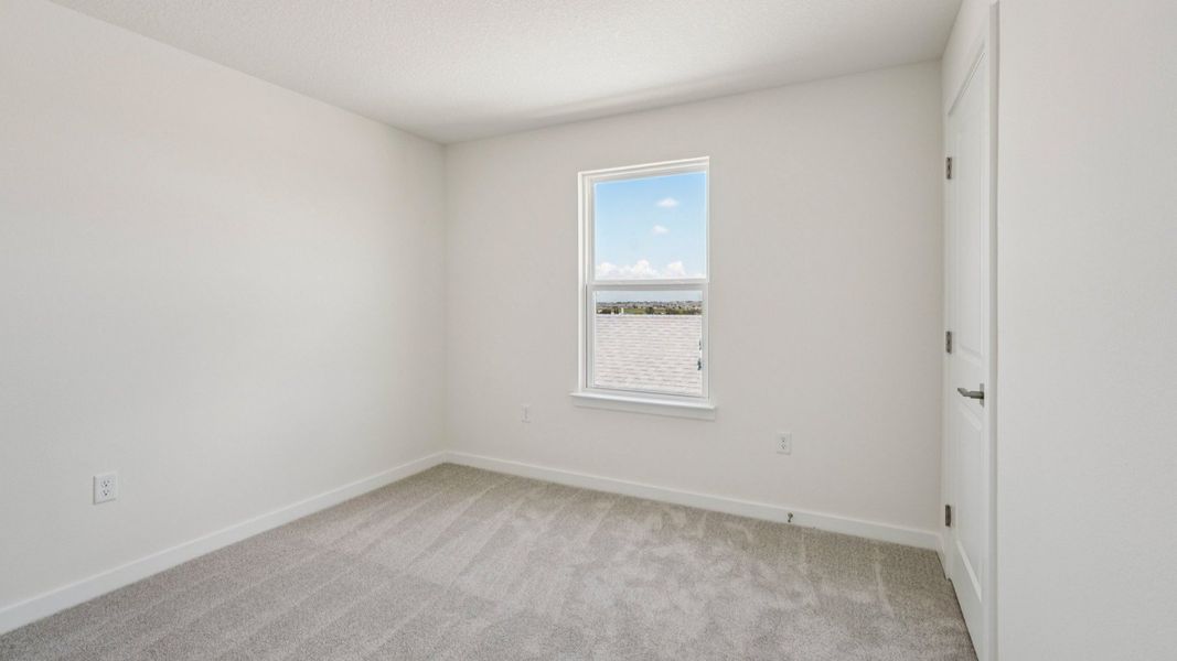 Third Bedroom located in the Jupiter in Hamilton Bluff located in Haines City, FL.