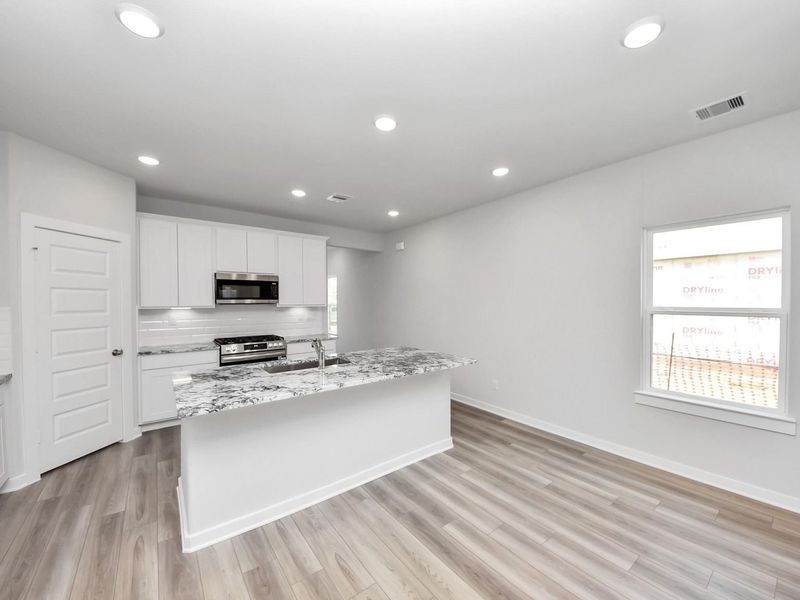 Furnished interior view inside a new home in Windmill Estates, Magnolia (Image 5).