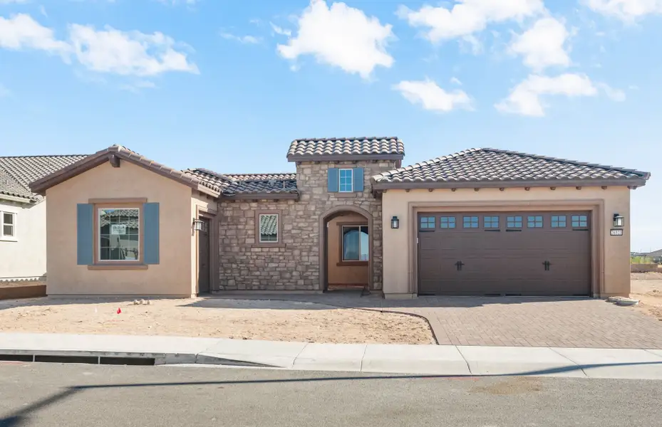 Front exterior of a new home in Sun City Festival, Buckeye, AZ, highlighting curb appeal (Image 18).