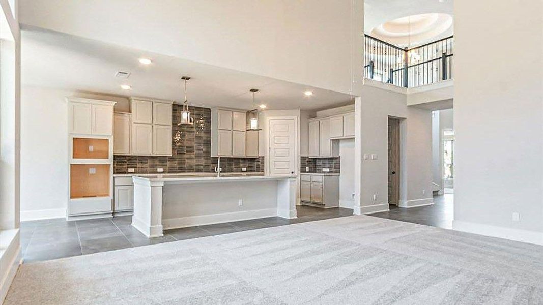 Furnished interior view inside a new home in Sunterra, Katy (Image 7).