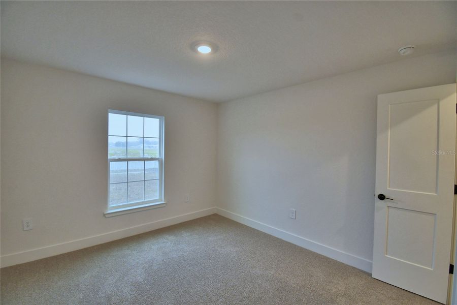 Spacious, unfurnished interior of a new home in Cadence Crossing, Auburndale (Image 43).