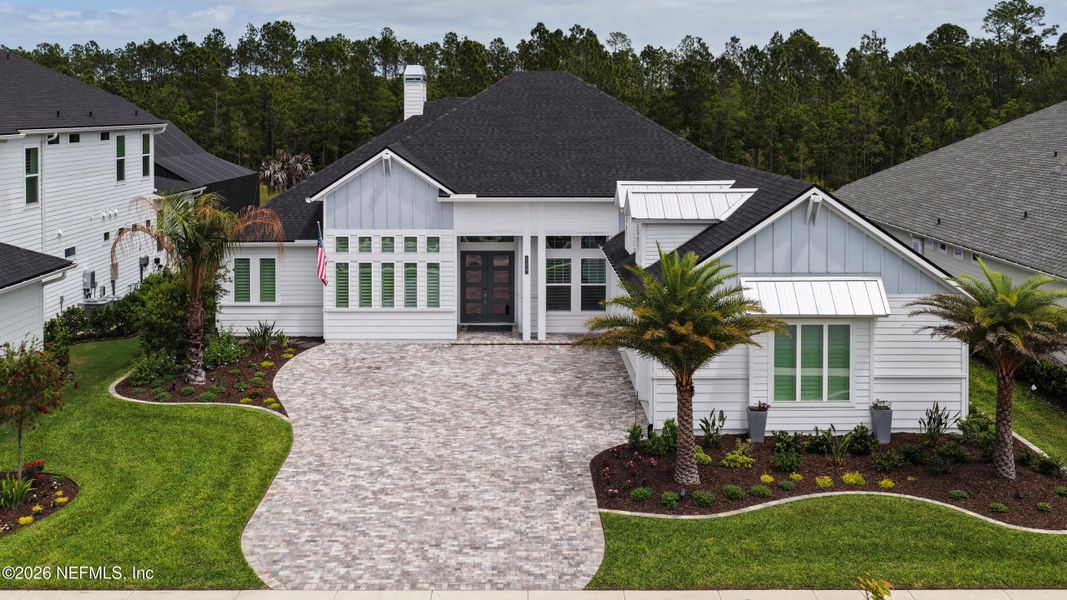 Front exterior of a new home in Nocatee, Ponte Vedra, FL, highlighting curb appeal (Image 1). Front exterior of a new home in Nocatee, Ponte Vedra, FL, highlighting curb appeal (Image 1).