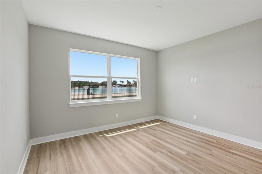 Spacious, unfurnished interior of a new home in Lagoon Residences at Epperson, Wesley Chapel (Image 50).