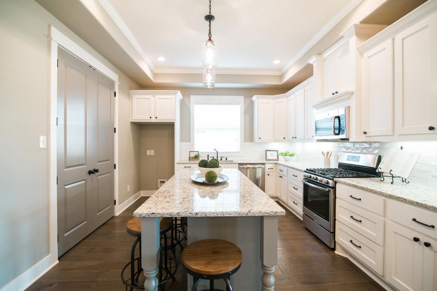 Representative furnished interior of a home built from the The Ashley by Reece Homes in Oakmont, Bryan (Image 24).