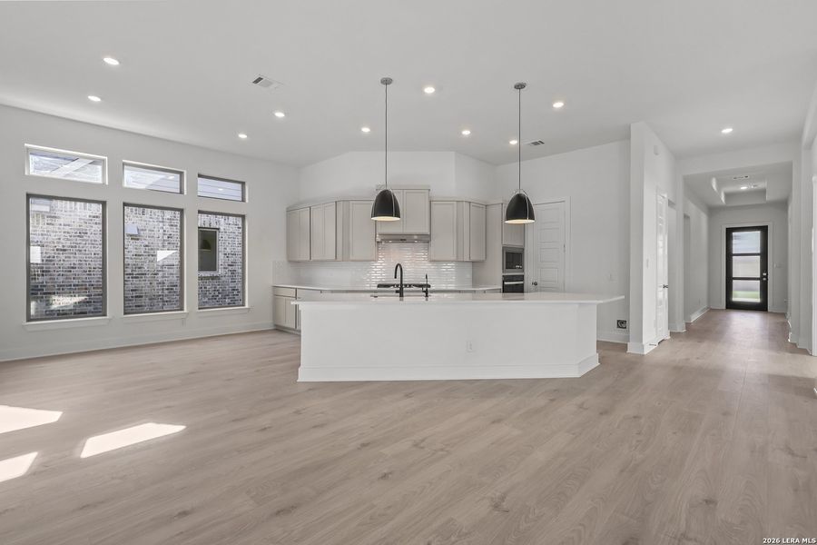 Furnished interior view inside a new home in Nopal Valley, San Antonio (Image 14).