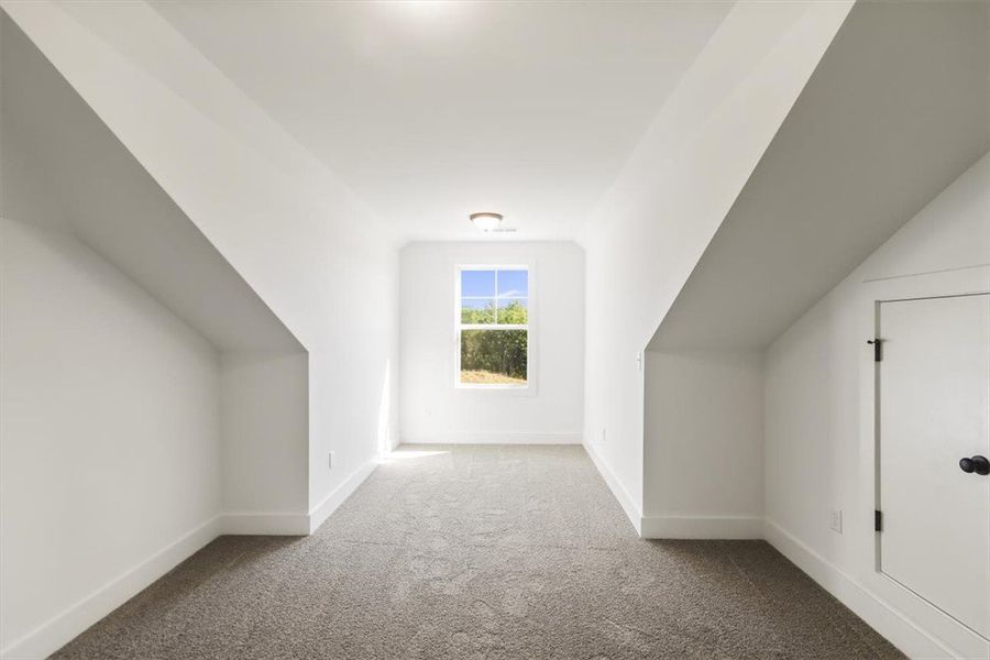 Angled ceilings and soft underfooting define this