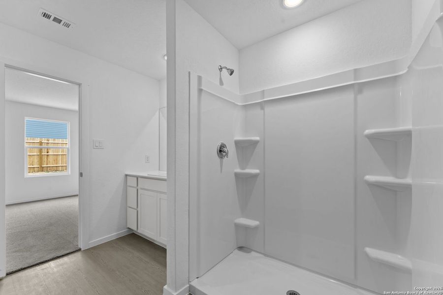 Furnished interior view inside a new home in Voss Farms, New Braunfels (Image 5).