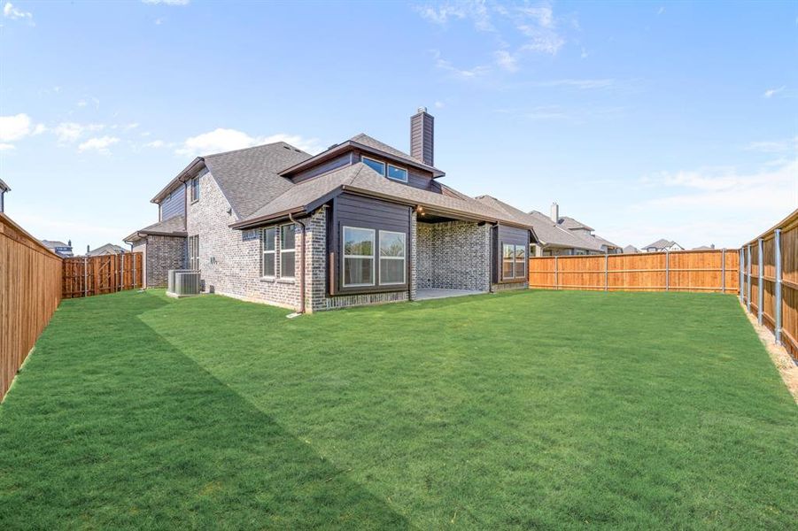 Exterior details and patio area of a home in Mockingbird Hills 60-65, Joshua (Image 3).