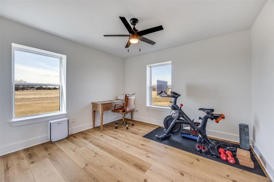 A second downstairs bedroom serves as an office and exercise area.