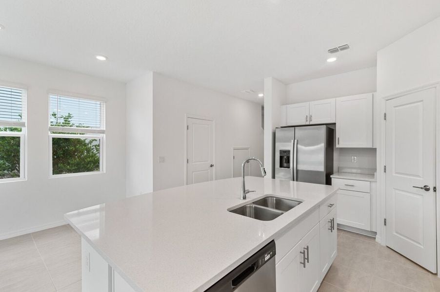 Furnished interior view inside a new home in Waterstone Townhomes, Groveland (Image 3). Furnished interior view inside a new home in Waterstone Townhomes, Groveland (Image 3).