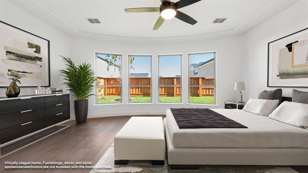 Bedroom with ceiling fan and dark wood-type flooring