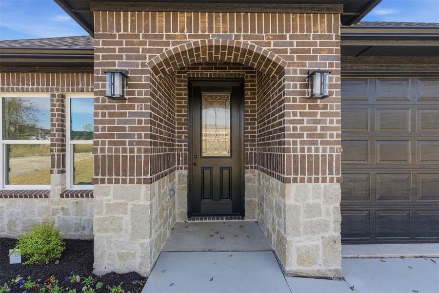 Exterior details and patio area of a home in , Tom Bean (Image 4).
