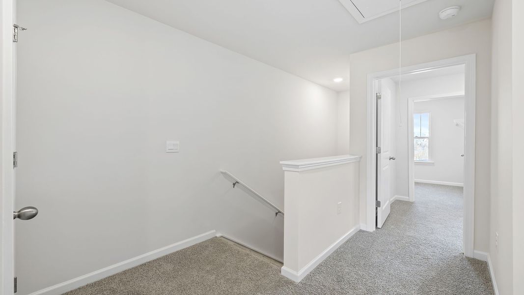 Spacious, unfurnished interior of a new home in Tanglewood Townes, Greenville (Image 16).