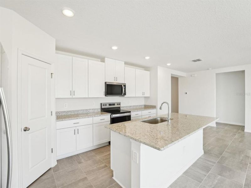 Furnished interior view inside a new home in Benton Hills - Classic Series, Brooksville (Image 9).