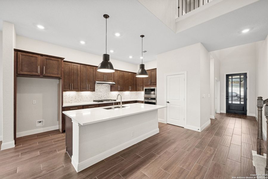 Furnished interior view inside a new home in Windsong - Reserve Series, Boerne (Image 16). Furnished interior view inside a new home in Windsong - Reserve Series, Boerne (Image 16).