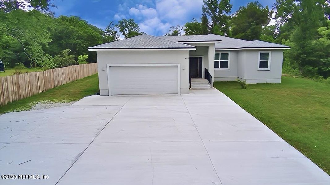Front exterior of a new home in , Jacksonville, FL, highlighting curb appeal (Image 16).