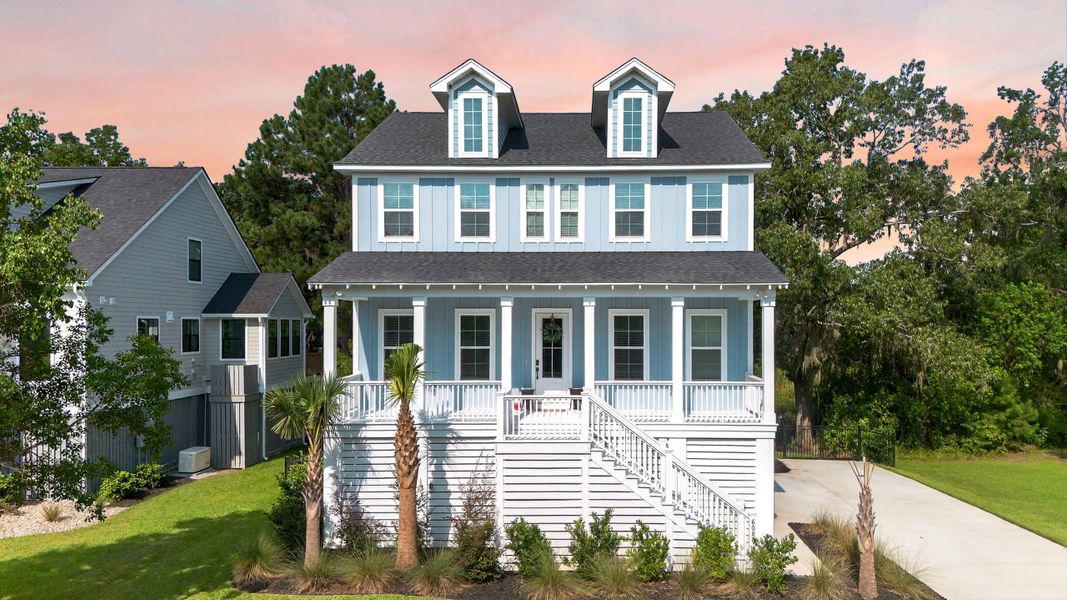 Front exterior of a new home in , Ravenel, SC, highlighting curb appeal (Image 20).