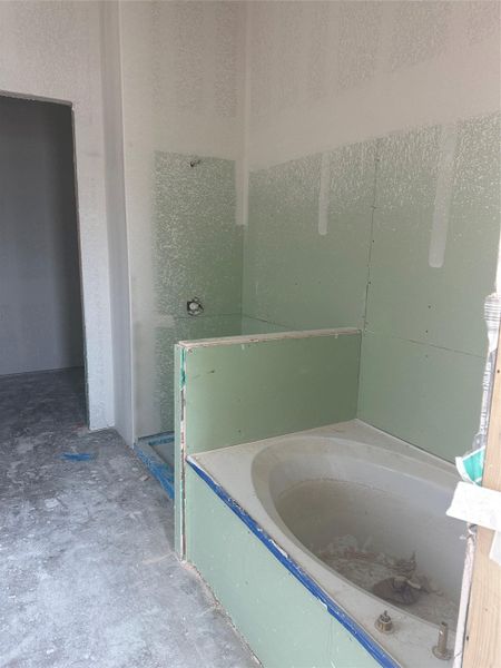 Primary Bath retreat with dual vanities, garden tub & walk-in shower