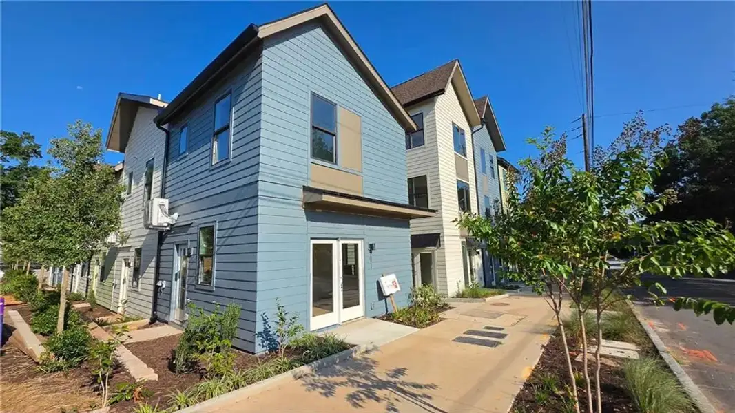 Front exterior of a new home in , Atlanta, GA, highlighting curb appeal (Image 1). Front exterior of a new home in , Atlanta, GA, highlighting curb appeal (Image 1).