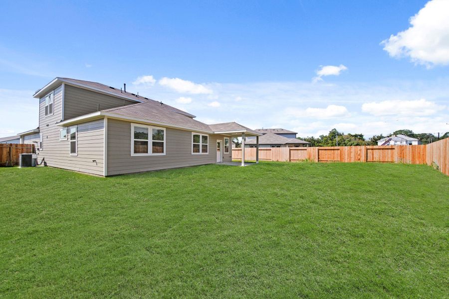 Exterior details and patio area of a home in Russell Ranch, Bay City (Image 21).