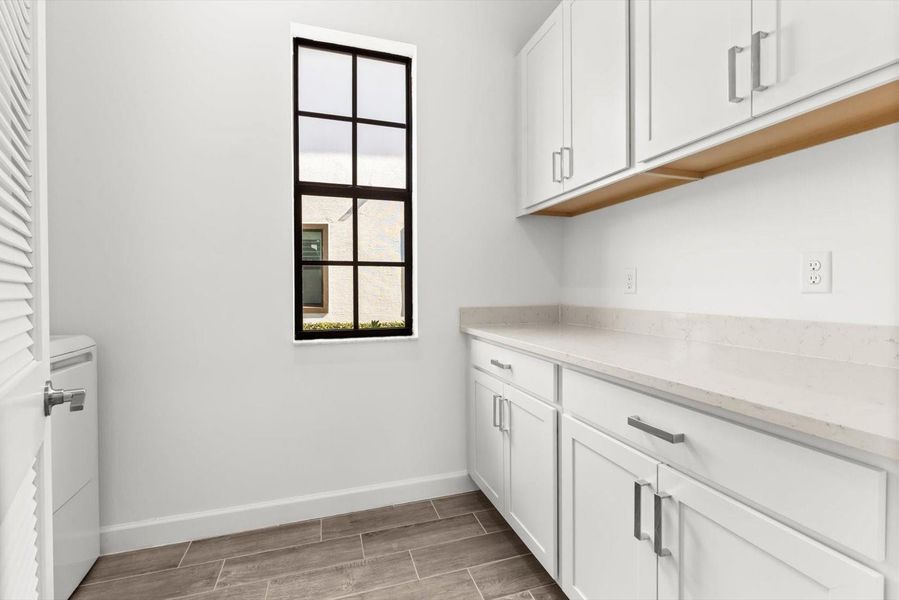 Furnished interior view inside a new home in Tesoro Club, Port St. Lucie (Image 29).