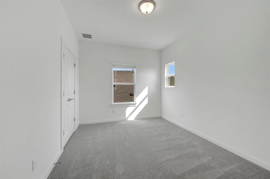 Spacious, unfurnished interior of a new home in Heritage, Dripping Springs (Image 8).