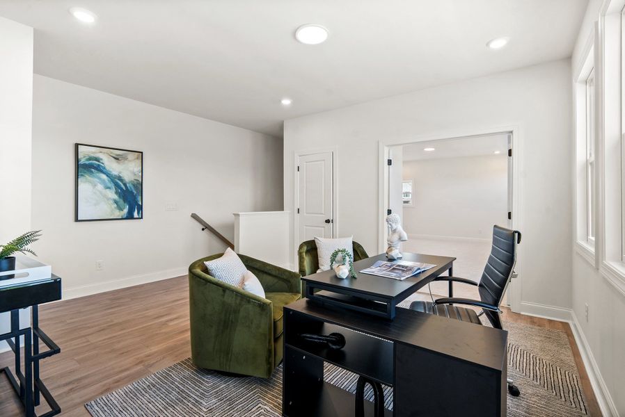 Representative furnished interior of a home built from the The Kenton by The Providence Group in Promenade at Sawnee Village, Cumming (Image 38).