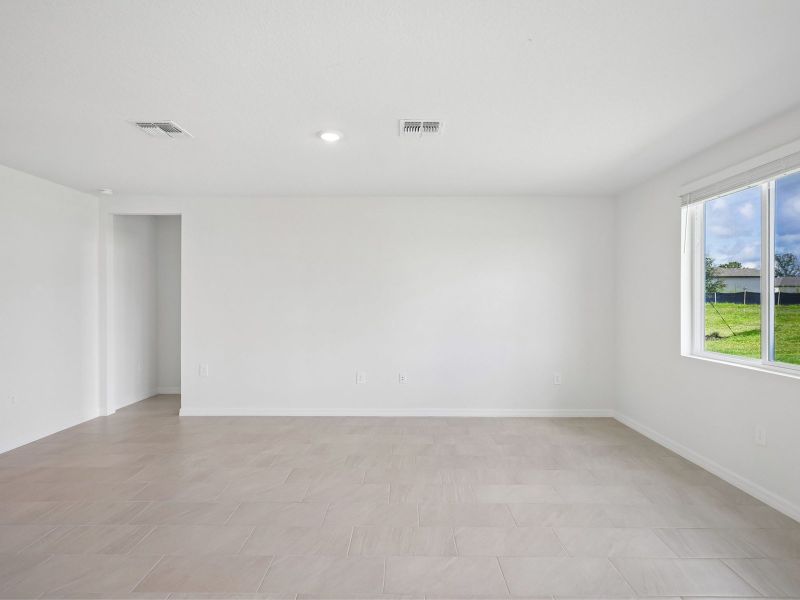 Spacious, unfurnished interior of a new home in The Reserve at Van Oaks, Auburndale (Image 13).