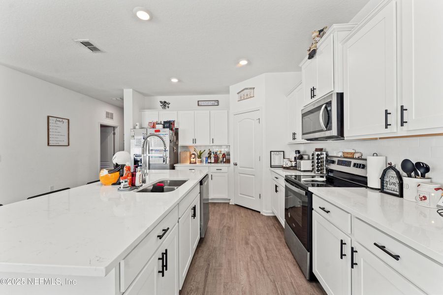 Furnished interior view inside a new home in Cross Creek Express, Green Cove Springs (Image 16).