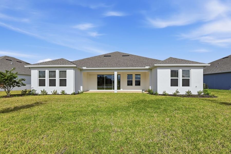 Exterior details and patio area of a home in Ardisia Park, New Smyrna Beach (Image 4). Exterior details and patio area of a home in Ardisia Park, New Smyrna Beach (Image 4).