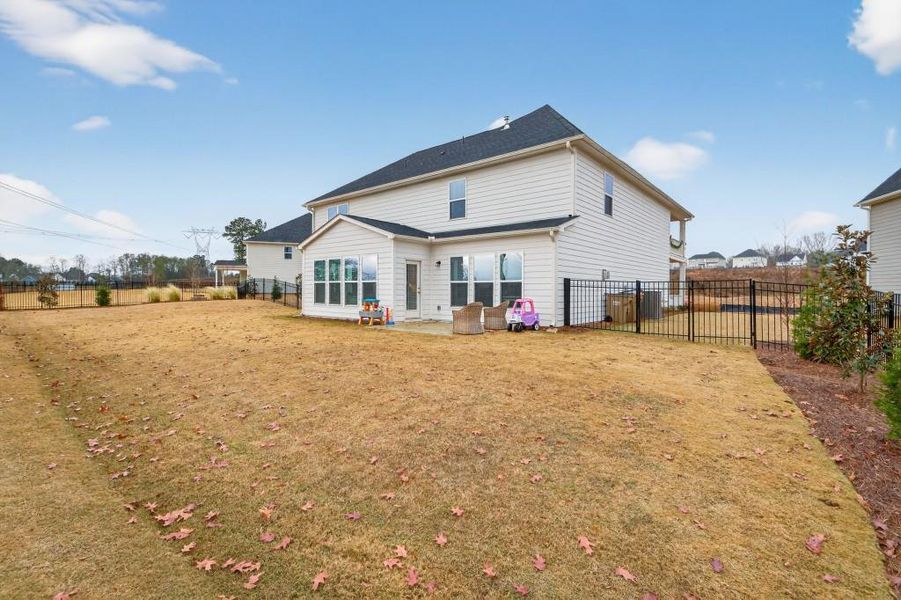 Exterior details and patio area of a home in Reunion, Flowery Branch (Image 24). Exterior details and patio area of a home in Reunion, Flowery Branch (Image 24).