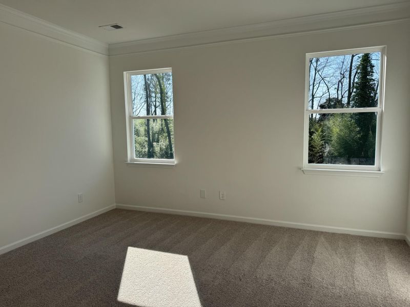 Spacious, unfurnished interior of a new home in East Main Townes, Spartanburg (Image 14).
