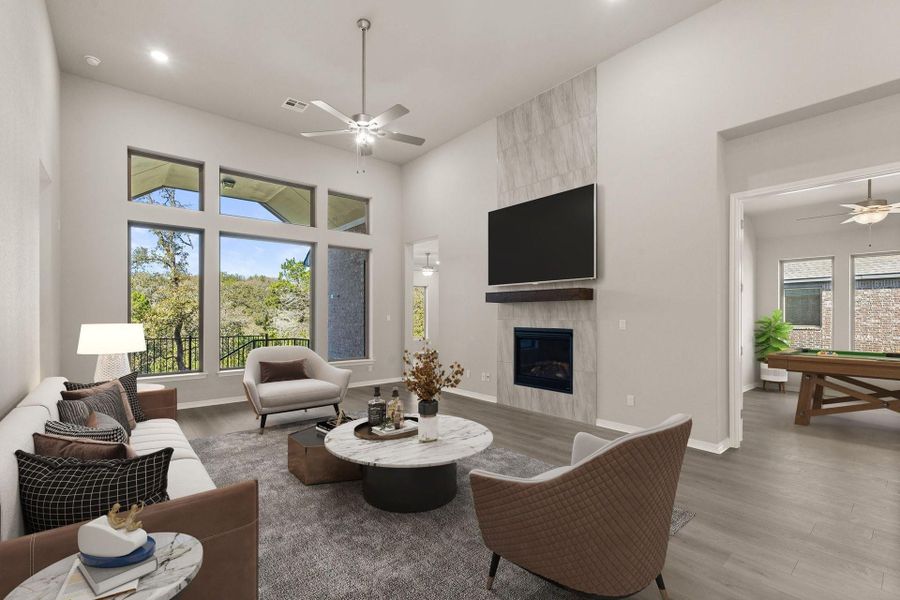 Family Room with Floor to Ceiling Fireplace - Virtually Staged